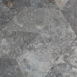 Close-up of peel and stick diamond gray stone tiles with a geometric pattern