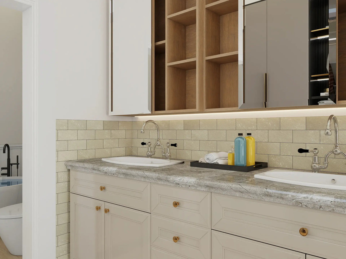 Colamo beige peel and stick subway tiles with black grout lines installed as a bathroom backsplash over a marble vanity.