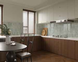 Modern kitchen featuring Colamo Cloud Gray subway peel and stick tiles in a vertical stacked pattern, paired with warm walnut cabinets for a sophisticated backsplash.